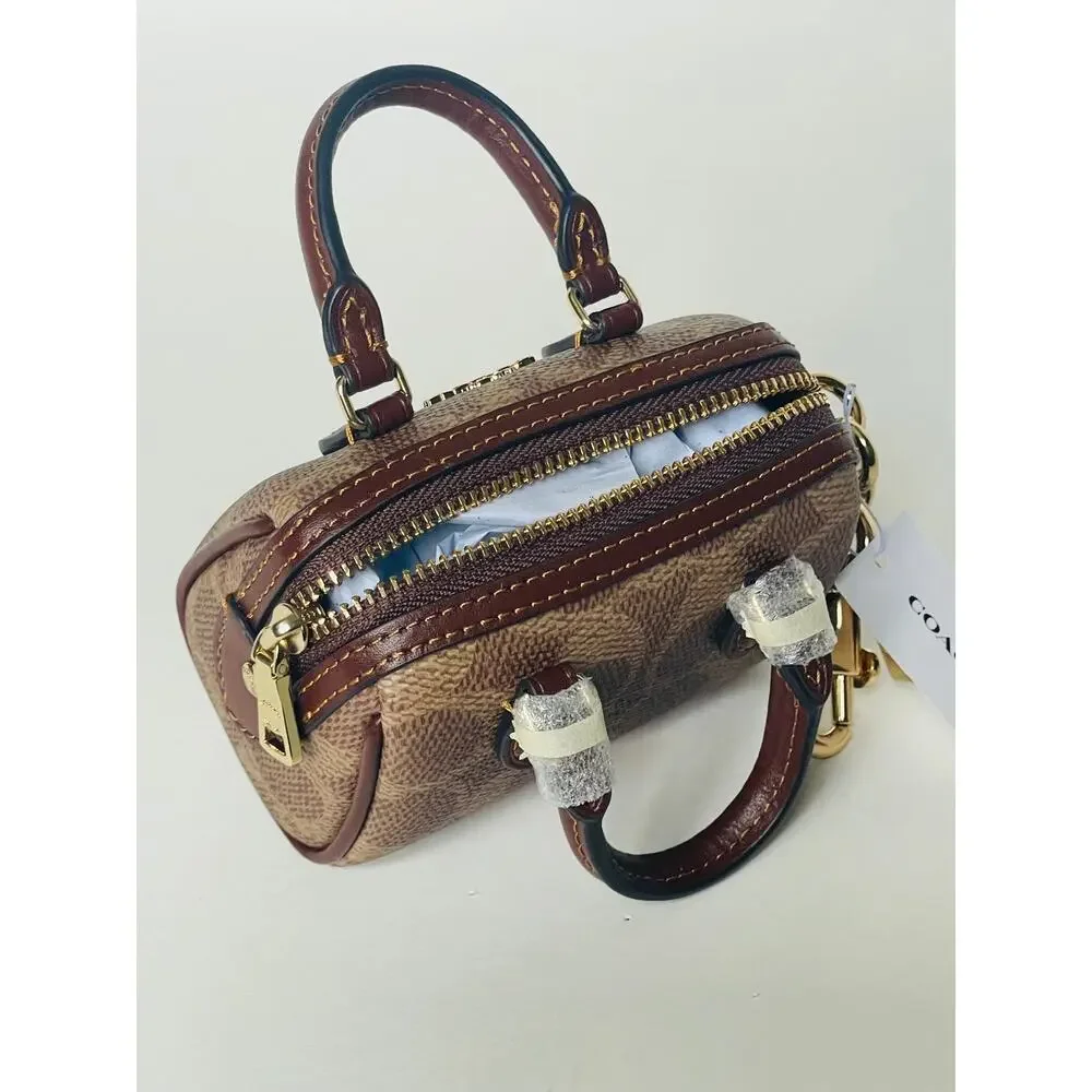 Coach Mini Rowan Bag Charm Brown Signature Canvas Leather Gold CX068